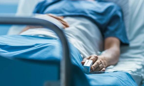 Hospital patient receiving care, representing affordable critical illness insurance plans in Kyle, TX.
