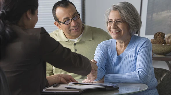 Family meeting with local Medicare agents, discussing Medicare options.