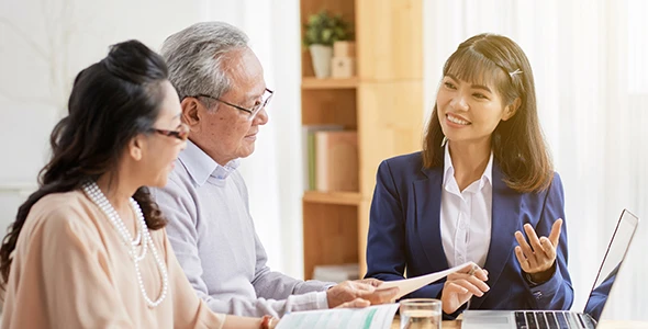 A family meeting with an insurance advisor to discuss health insurance solutions in Buda, TX.