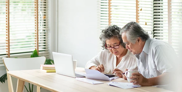 A family discussing final expense and burial insurance options with a financial advisor in Buda, TX.