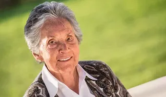 Policy summary for an 83-year-old female with no conditions, offering a \$415,000 offer.