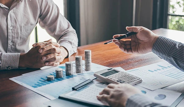 Financial professionals working on tax-efficient wealth strategies for a client in Kyle, TX.
