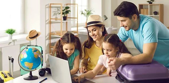 Family reviewing trip cancellation and interruption insurance options in Kyle, TX.